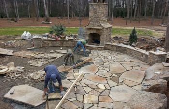 Lane Landscaping staff while constructing a flagstone patio